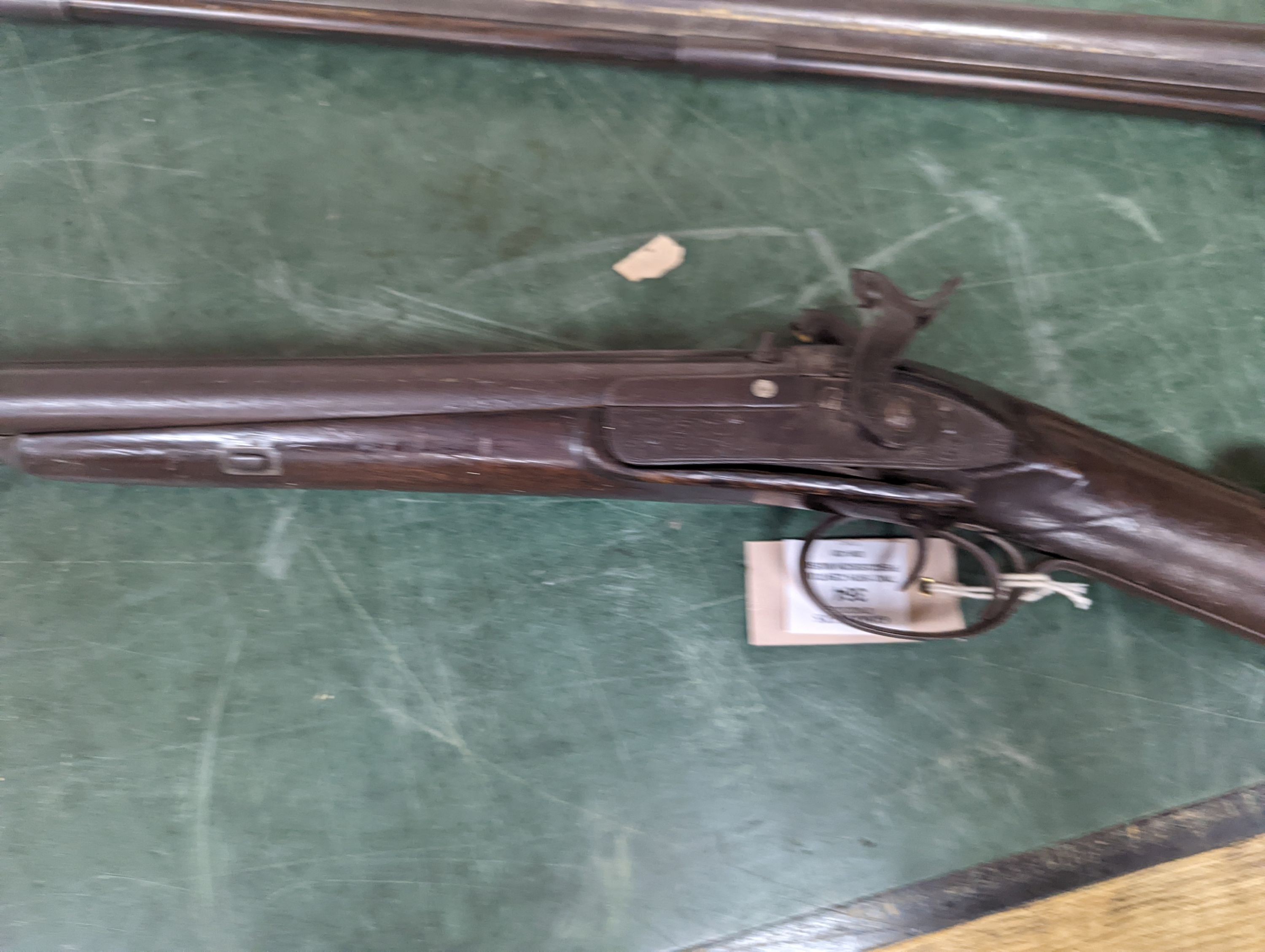 Two 19th century percussion muskets, 103cm. max., one double-barrelled